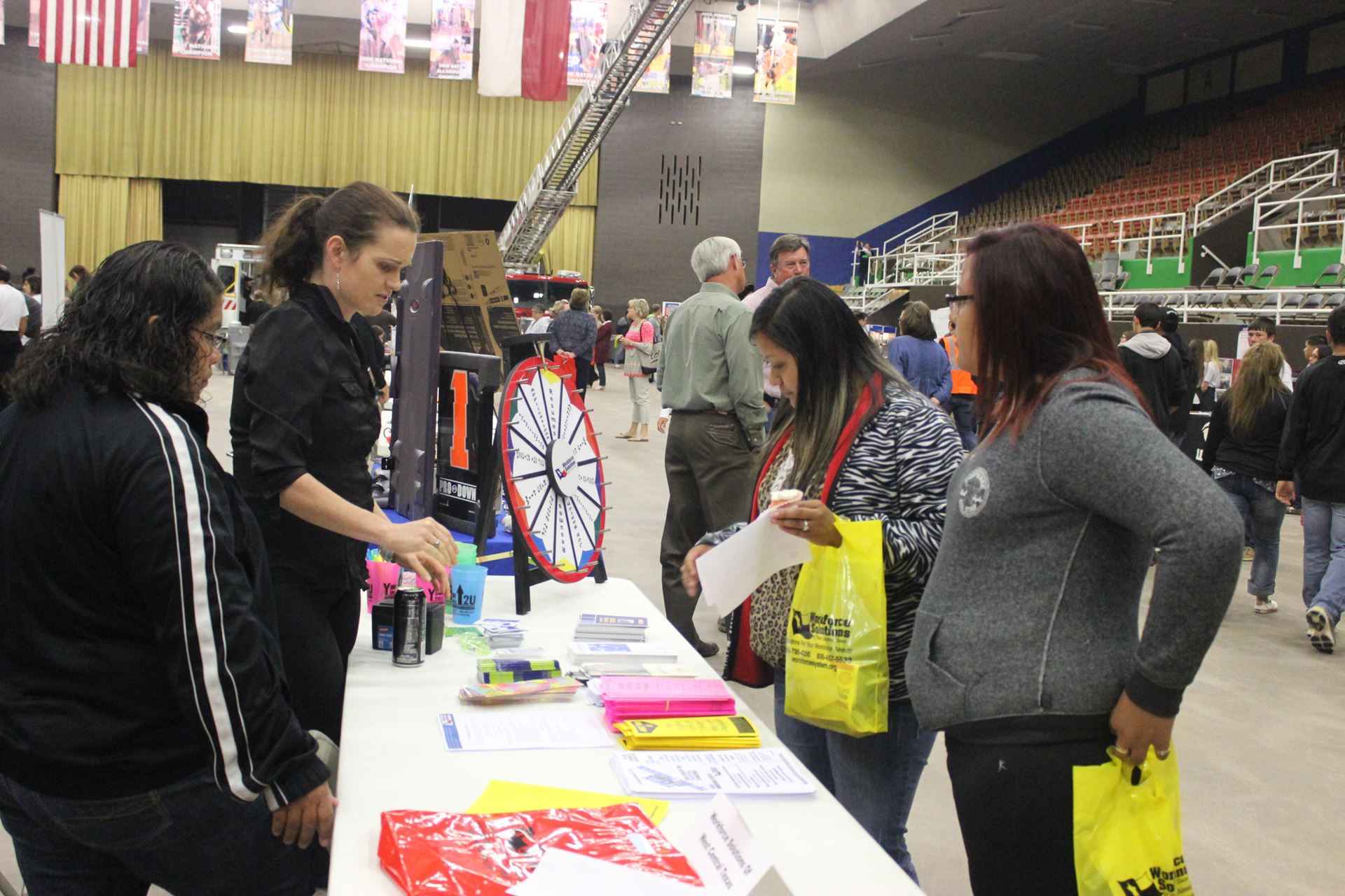Students talk with representatives from Workforce Solutions.